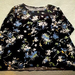 Zac and Rachel black blouse with multicolored floral print.